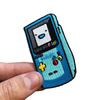GBC x BMO embroidered crossover patch inspired by Adventure Time and retro gaming with iron on backing – Akira Gallery
