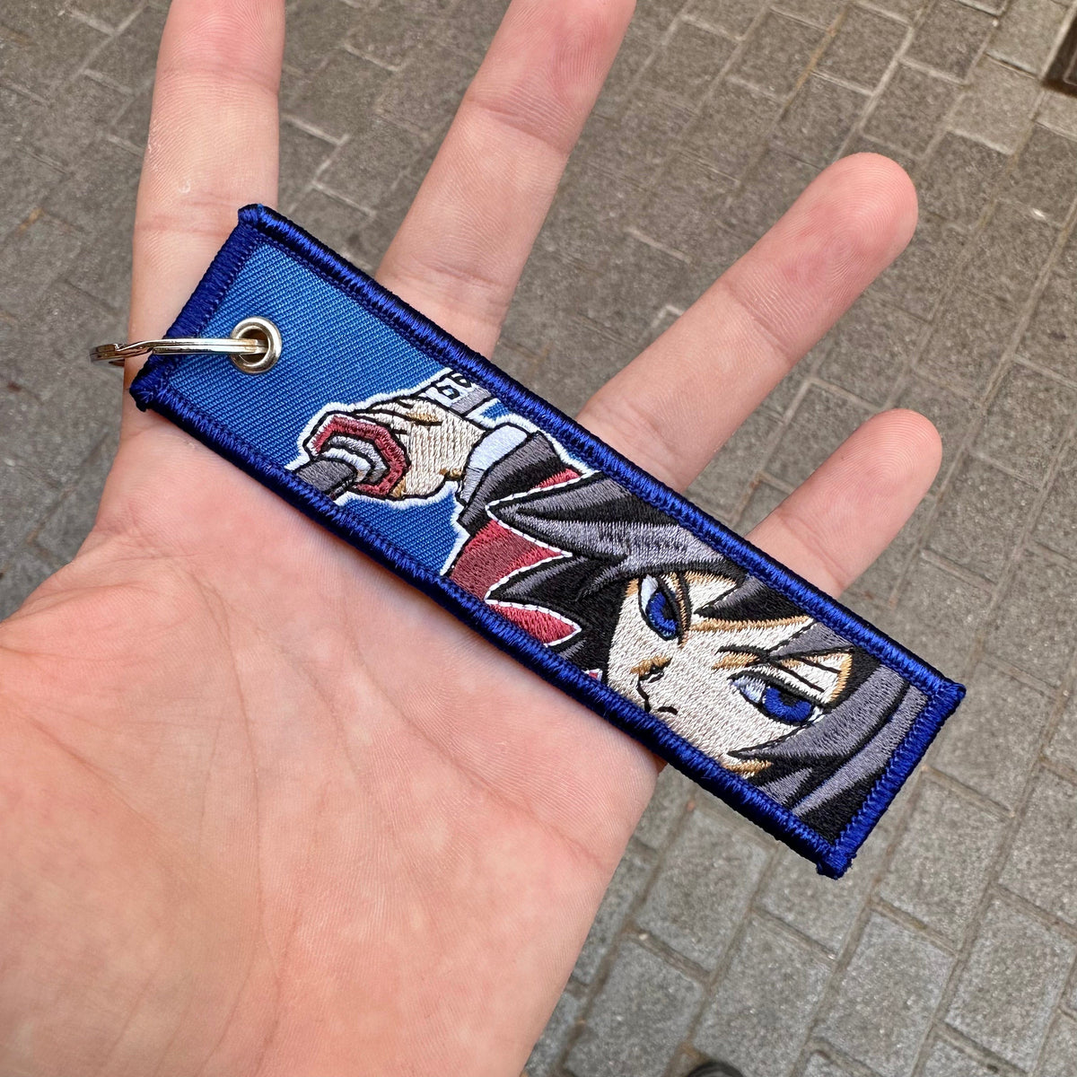 Detail Giyu Tomioka embroidered anime keytag inspired by Demon Slayer – Akira Gallery