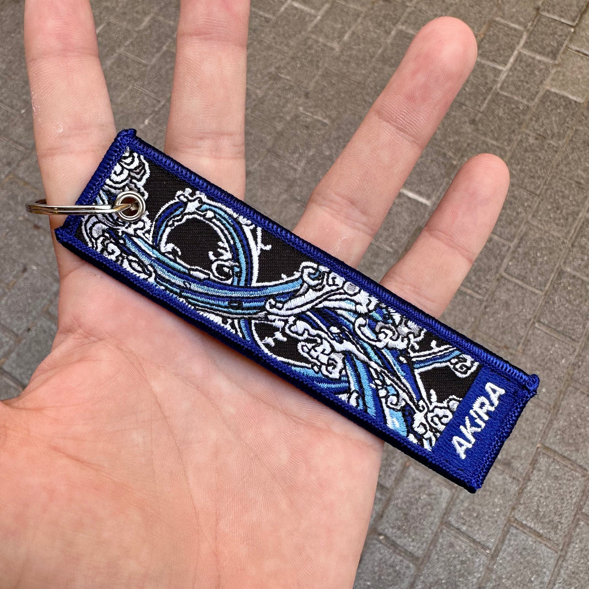 Back view of Giyu Tomioka embroidered keytag – anime keychain – Akira Gallery
