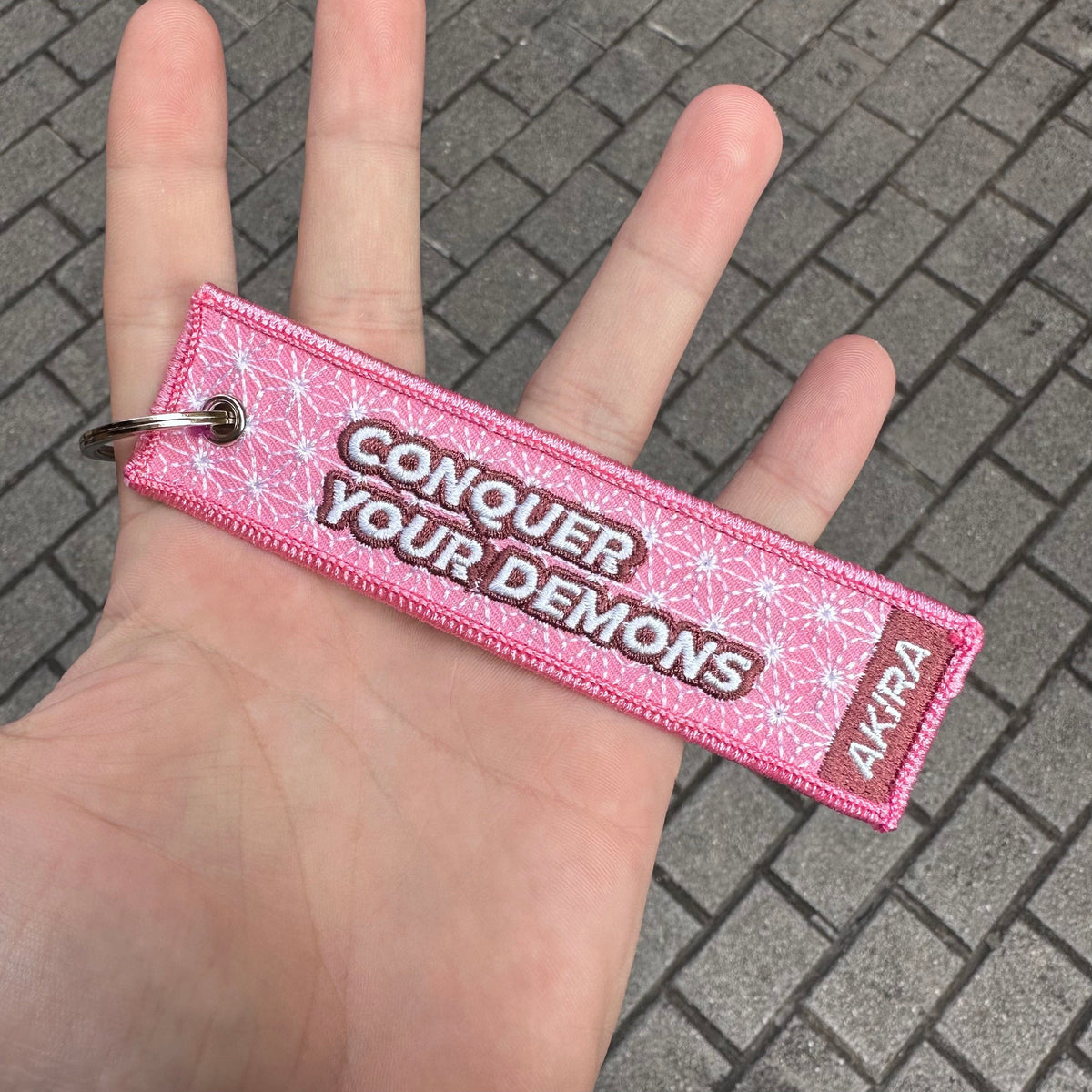 Back view of Nezuko Kamado embroidered keychain – anime keychain – Akira Gallery
