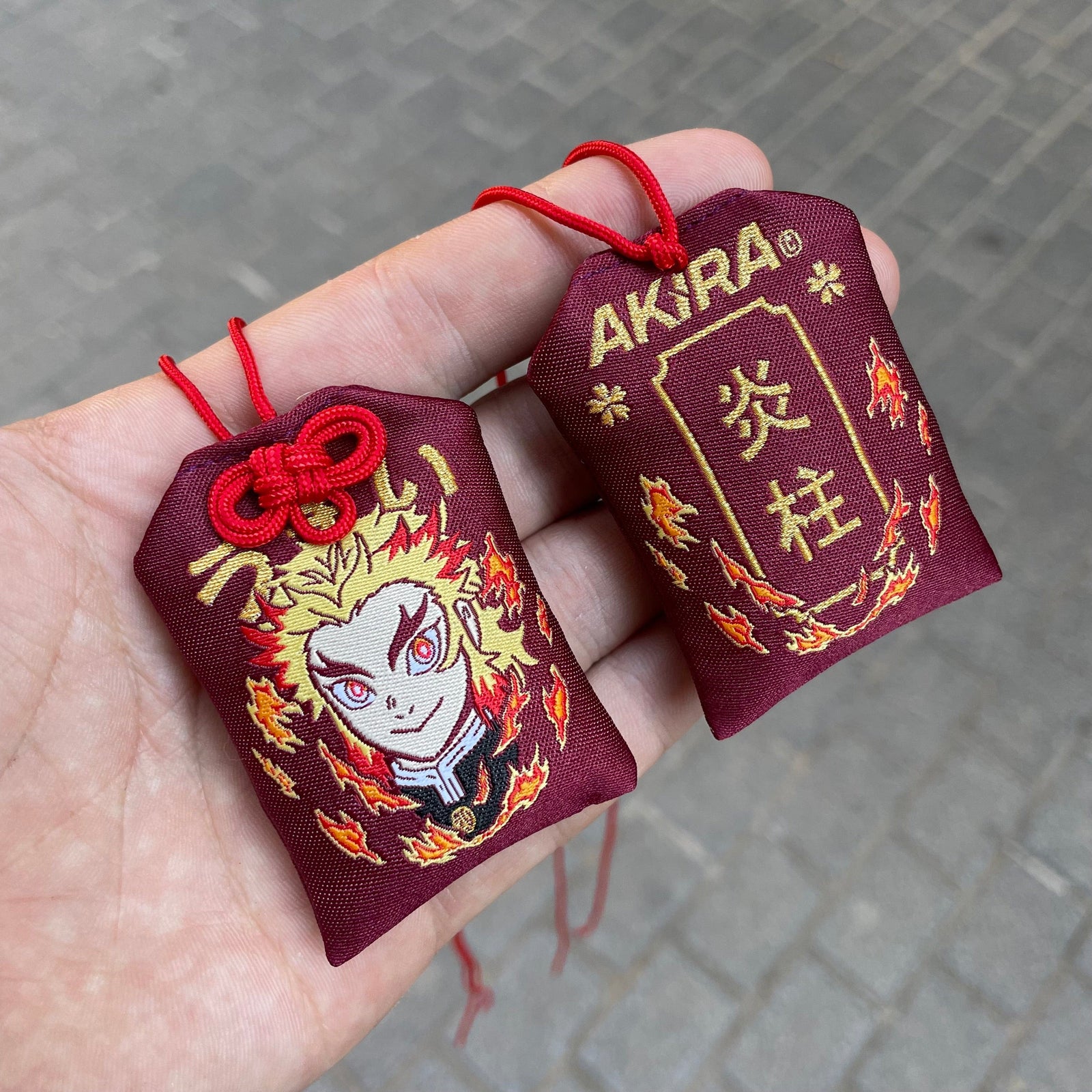 Anime-inspired Kyojuro Rengoku Japanese style omamori charm
