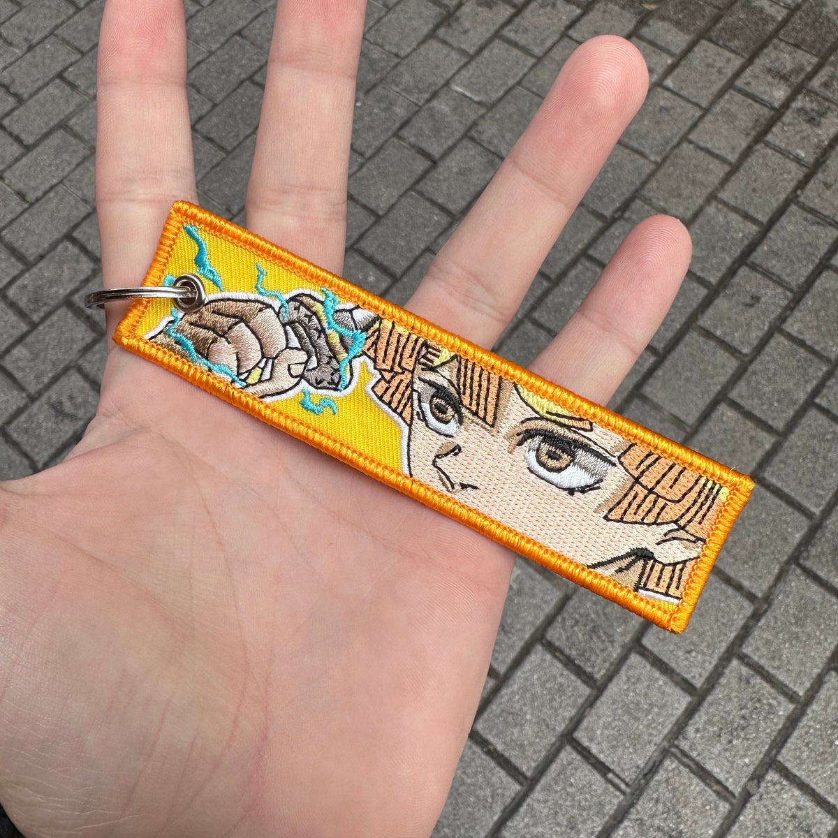 Front view of Zenitsu Agatsuma embroidered keychain – anime keychain – Akira Gallery